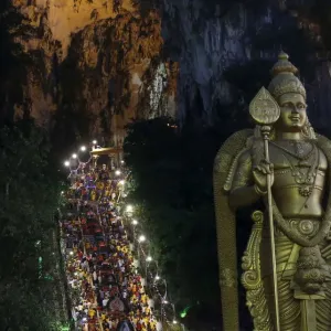 Hindu devotees climb the steps to Batu Caves during Thaipusam in Kuala Lumpur, Malaysia