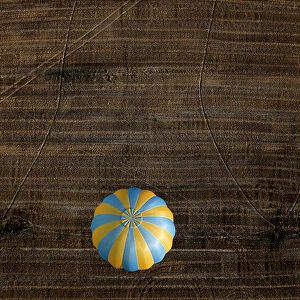 A hot air balloon flies during a hot air ballooning event in Todi