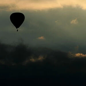 A hot air balloon passes over Northamptonshire during the 2005 Northampton Balloon Festival