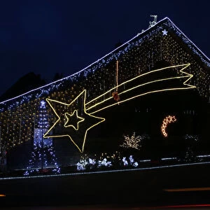 A house is decorated with a huge Star of Bethlehem in the village of Brueggen near