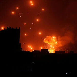 A Houthi arms depot explodes after it was hit by air strikes in Sanaa, Yemen