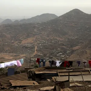 Huts and houses are seen on the hills of Nueva Esperanza ( New Hope