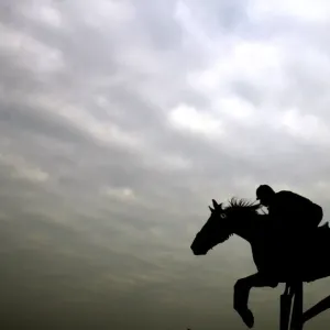An Indian horse rider jumps an obstacle during a horse show in Kolkata An Indian horse rider jumps an obstacle during a horse show in Kolkata