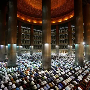 Indonesian Muslims pray at the first day of holy fasting month of Ramadan at Istiqlal