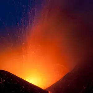 Italys volcanic Mount Etna spews lava during an eruption on the southern Italian island