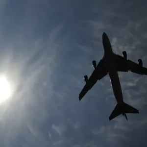 A jumbo jet takes off shortly after midday in London A jumbo jet takes off shortly after midday in London