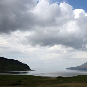 Lag Bay beach and the island of Rum are seen on the island of Eigg, Inner Hebrides