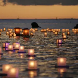 Lanterns float on the water during the Japanese ceremony Toro Nagashi in Honolulu