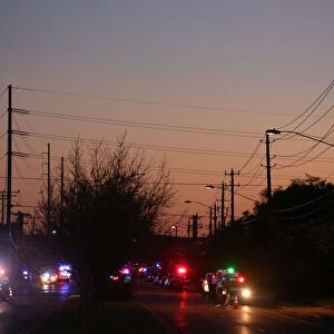 Law enforcement personnel investigate an incident in Austin