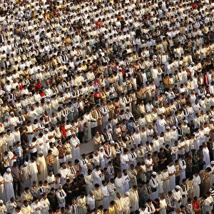 Libyans attend an Eid al-Fitr prayer in Tripoli