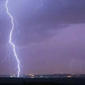 Lightning strikes over Gaza in this general view seen from across the border in southern Lightning strikes over Gaza in this general view seen from across the border in southern