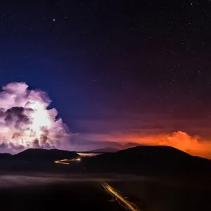 A long time exposure shows molten lava which flows from the Piton de la Fournaise A long time exposure shows molten lava which flows from the Piton de la Fournaise