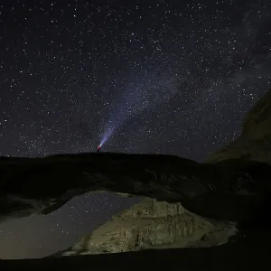 A man watches the stars seen on the sky of Al-Kharza area in Wadi Rum in the south of A man watches the stars seen on the sky of Al-Kharza area in Wadi Rum in the south of