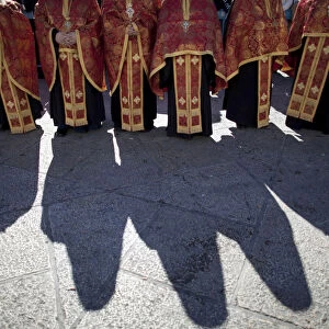 Members of the clergy wait for the Eastern Orthodox Christmas procession in Bethlehem