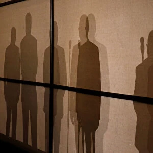 Members of the Lima Group cast their shadows during a meeting in Santiago