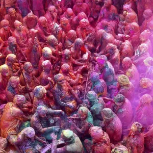 Men daubed in colours celebrate Lathmar Holi at Nandgaon Men daubed in colours celebrate Lathmar Holi at Nandgaon