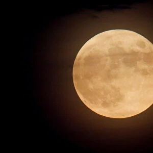 The full moon is seen from West Orange in New Jersey