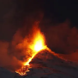 Mount Etna spews lava on the southern Italian island of Sicily