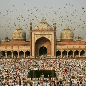 Muslims attend the Eid-al-Fitr prayers at the Jama Masjid in Delhi Muslims attend the Eid-al-Fitr prayers at the Jama Masjid in Delhi
