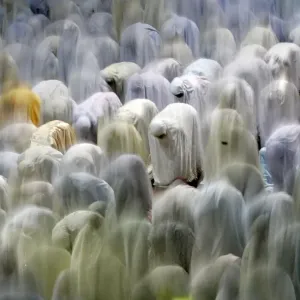Muslims attend prayers on the eve of the first day of the Islamic fasting month of