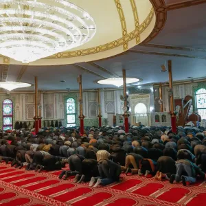 Muslims pray at the Brussels Great Mosque in Brussels Muslims pray at the Brussels Great Mosque in Brussels