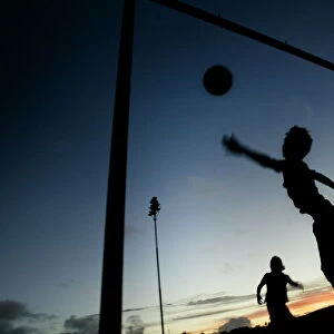 NATIVES RAPA NUI BOYS PLAY FOOTBALL ON EASTER ISLAND
