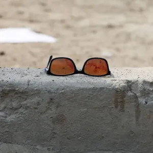 A pair of sunglass with blood is seen at the site of a suicide bomb attack near a Shi ite
