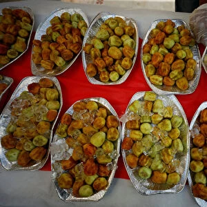 Peeled prickly pears are displayed for people to taste during a cactus fruits exhibition