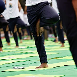 People perform yoga at India Gate on International Yoga Day in New Delhi