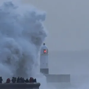 People view large waves and high winds associated with Storm Eleanor as they hit People view large waves and high winds associated with Storm Eleanor as they hit