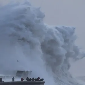 People view large waves and high winds associated with Storm Eleanor as they hit People view large waves and high winds associated with Storm Eleanor as they hit