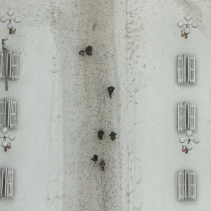 People walk across snow covered street in Berlin People walk across snow covered street in Berlin