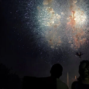 People watch fireworks during the 4th of July Independence Day celebrations at the