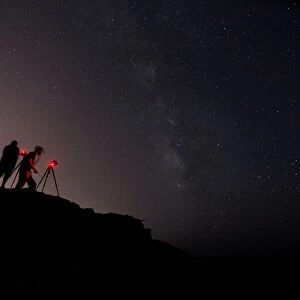 Photographers take pictures of stars and the Milky Way at Rdum il-Qammieh