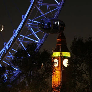 A pod from the London Eye is seen in front of Big Ben at the Houses of Parliament