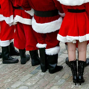 Professional Santa Claus performers attend a training day in London