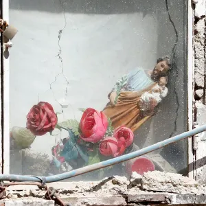 A religious statue slumps to the side after an earthquake hit the island of Ischia