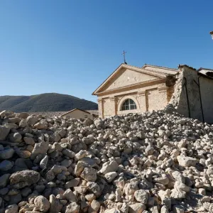 Saint Anthony church is seen partially collapsed following an earthquake along the road