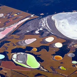 Salt pans and dams can be seen in farming areas located in the southern region of