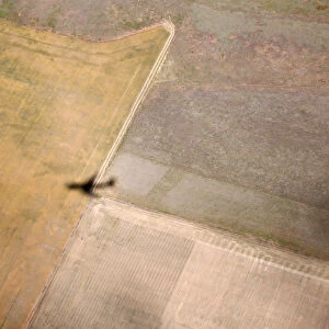 The shadow of Air Force One passes over fields near Great Falls, Montana
