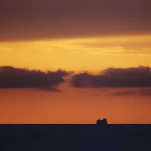 A ship is seen on the horizon of the Atlantic ocean, in Havana A ship is seen on the horizon of the Atlantic ocean, in Havana