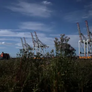 Shipping containers stacked on a cargo ship are seen in the dock at the ABP port in Shipping containers stacked on a cargo ship are seen in the dock at the ABP port in