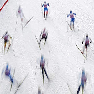 Skiers compete during the mens team sprint cross-country skiing World Cup at the Sprint