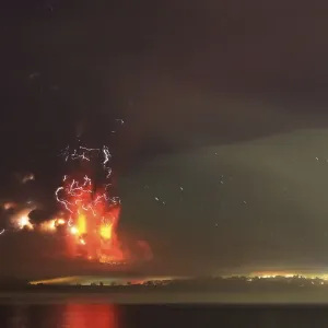 Smoke and lava spew from the Calbuco volcano, as seen from the shores of Lake Llanquihue Smoke and lava spew from the Calbuco volcano, as seen from the shores of Lake Llanquihue