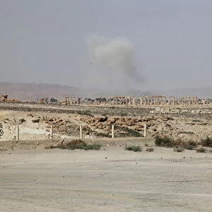 Smoke rises due to what activists said was shelling from Islamic State fighters