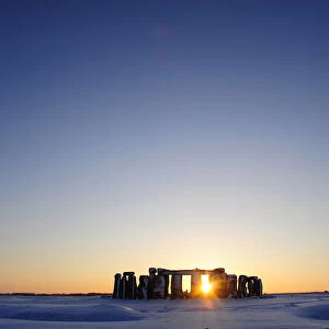 Snow covers the plains surrounding Stonehenge in Wiltshire, southern England