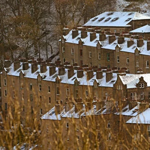 SNOW LIES ON THE ROOFS OF HOUSES IN HEBDEN BRIDGE AFTER A HEAVY SNOW FALL OVER NIGHT