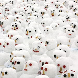 Snowmen are lined up Sapporo Snow Festival in Sapporo, northern Japan