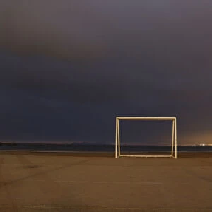 A soccer goalpost stands at Pescadores beach in Chorrillos, Lima