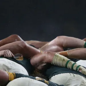 South Africa players compete in a scrum with New Zealand players